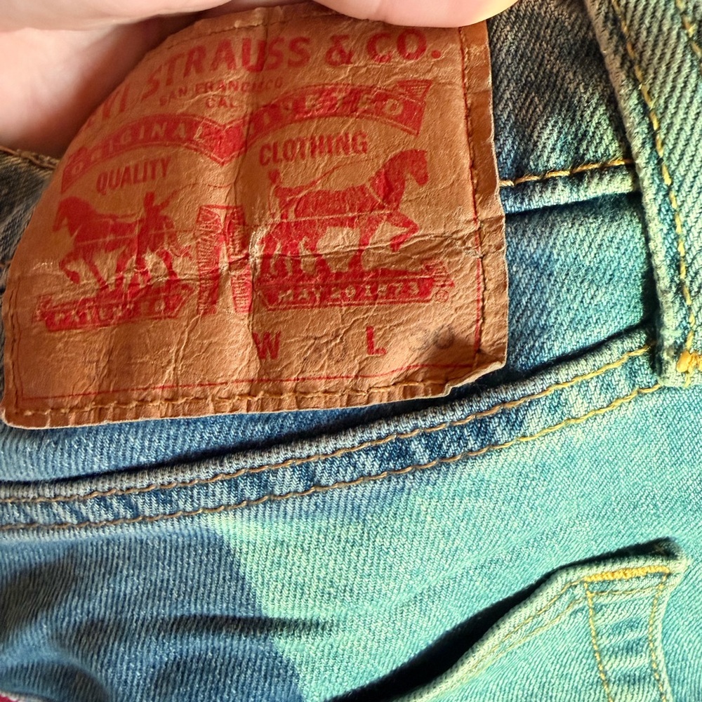 Levi's Denim Jeans in Light Blue with Tan Leather Patch